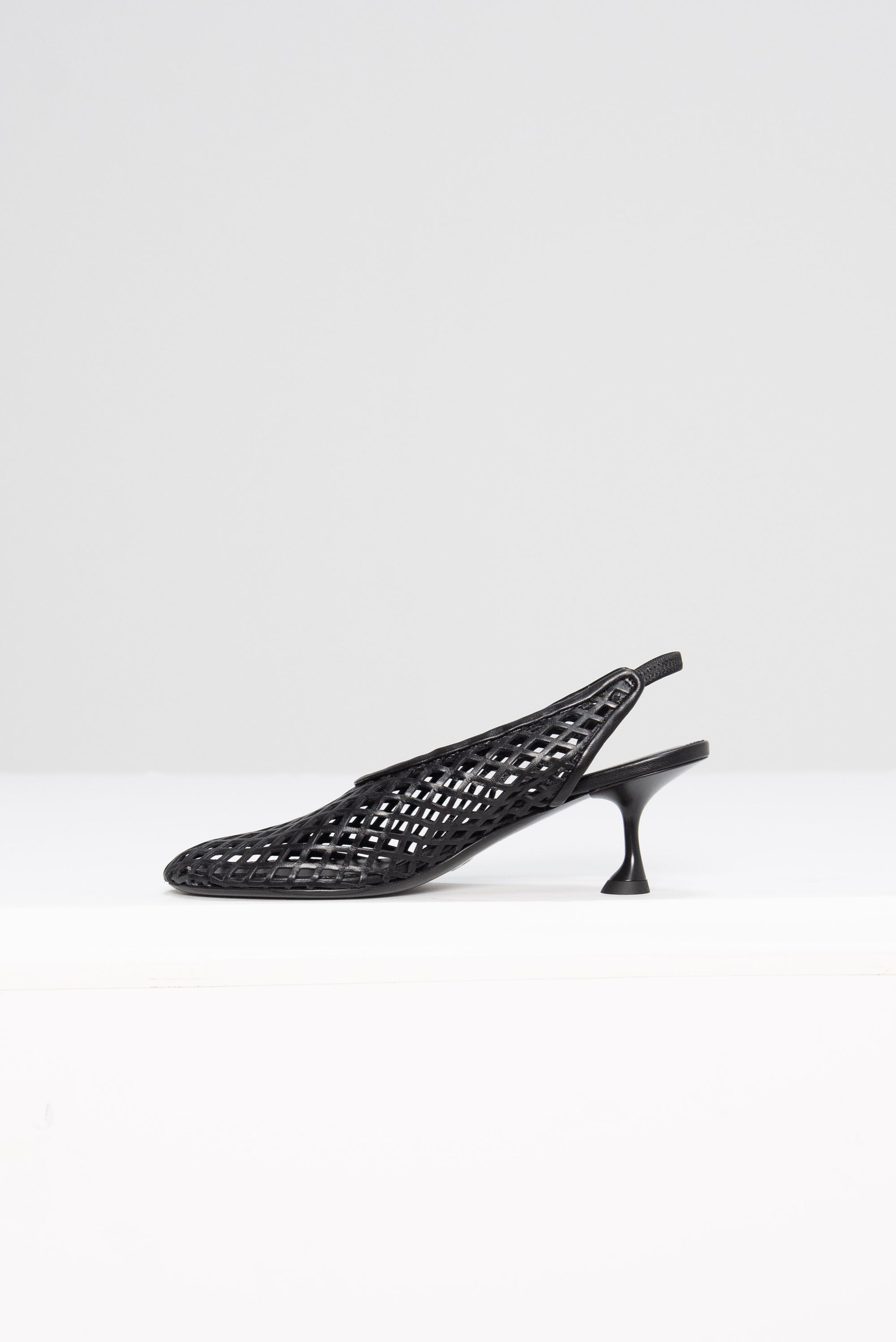 Tee Perforated Slingback Pumps, Black