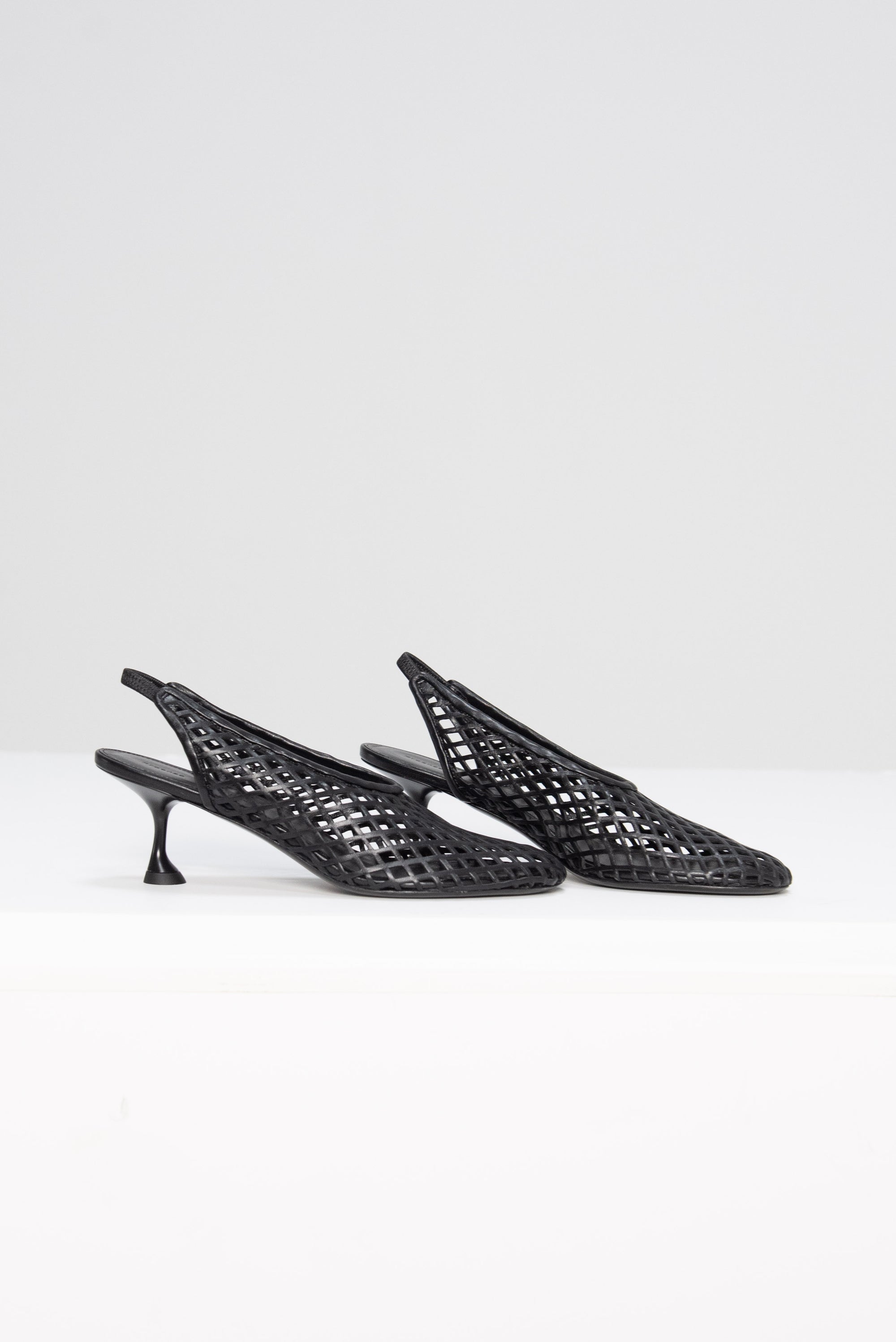 Tee Perforated Slingback Pumps, Black