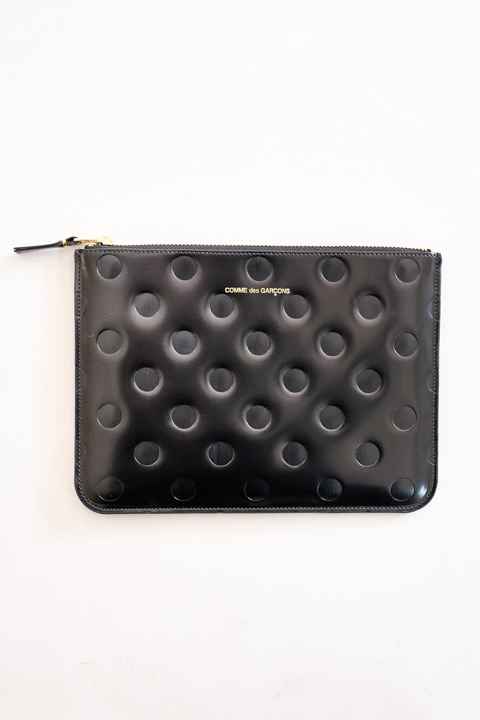 DOTS EMBOSSED LEATHER POUCH, BLACK